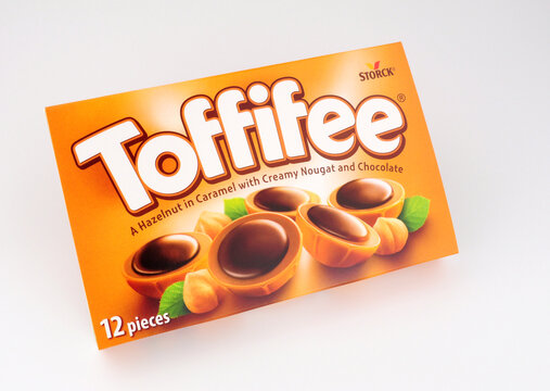 Box of Toffifee hazelnut and caramel candy cups topped with chocolate manufactured by Storck