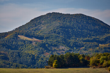 View of countryside hilly landscape in autumn colors.