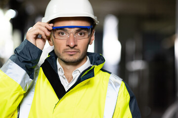 Portrait of Professional Engineer or Worker Wearing Safety Uniform and Hard Hat. Ecology worker Industrial people. Sustainable energy. Technology