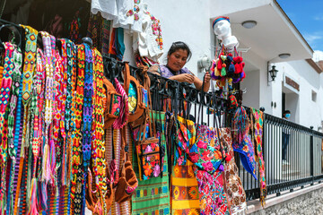 Fototapeta na wymiar young adult latina woman opening a store 