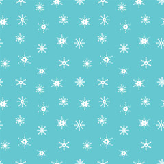 Seamless pattern with snowflakes on blue background