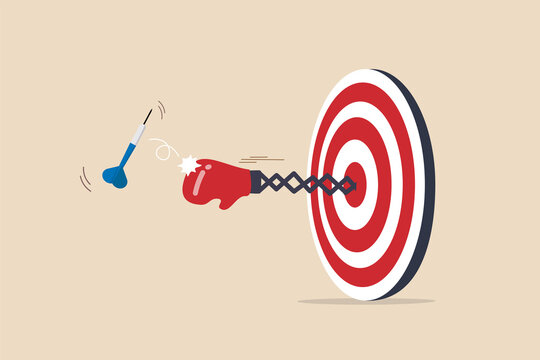Tough time or career struggle, trouble, difficulty or obstacle to achieve business target, hard situation to losing competition, boxing glove come out of dartboard bullseye to punch dart from target.