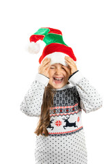 laughing girl in white knitted Christmas sweater with reindeer play with dwarf hat, isolated on white background. 