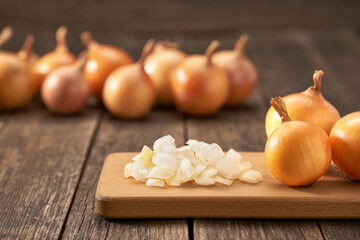 chopped onions on a cutting board.