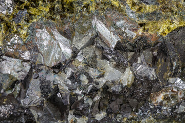 Macro mineral Epidote stone on a white background