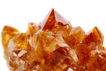 Macro mineral stone Citrine in rock in crystals on a white background