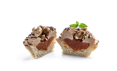 Halved shortcrust pastry with whipped cream custard and walnut isolated on white