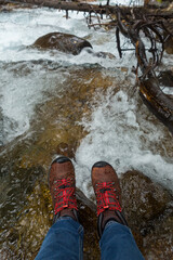 Women's feet in trekking boots