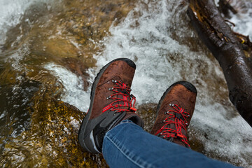 Women's feet in trekking boots