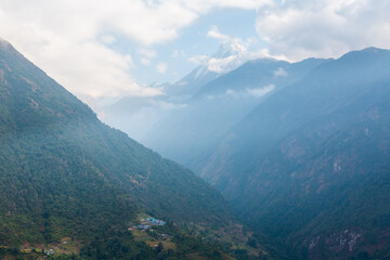Fototapeta premium Asian mountain village and terrace fields in autumn, Nepal, Himalaya, Annapurna Conservation Area