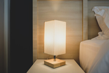 Interior photography of a modern style bedroom hotel side tables and lamps