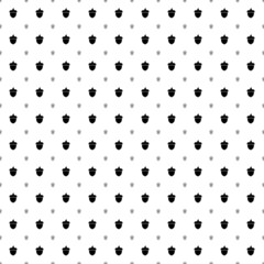 Square seamless background pattern from black acorn symbols are different sizes and opacity. The pattern is evenly filled. Vector illustration on white background