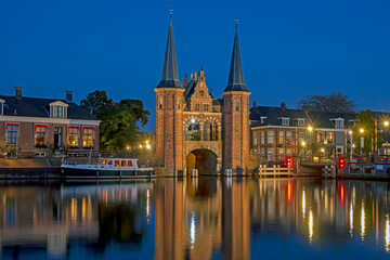 Fototapeta na wymiar The watergate in Sneek in Friesland the Netherlands at night