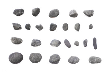 Set of black sea pebbles isolated on the white background.