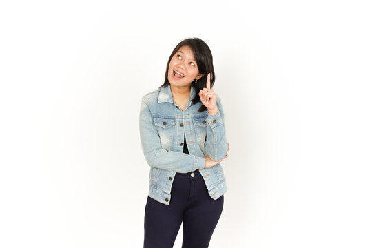 Thinking of Beautiful Asian Woman Wearing Jeans Jacket and black shirt Isolated On White Background