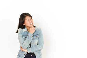 Fototapeta premium Thinking of Beautiful Asian Woman Wearing Jeans Jacket and black shirt Isolated On White Background