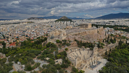 Fototapeta premium Aerial drone photo of Masterpiece Acropolis hill and the Parthenon on a beautiful cloudy morning, Athens, Attica, Greece