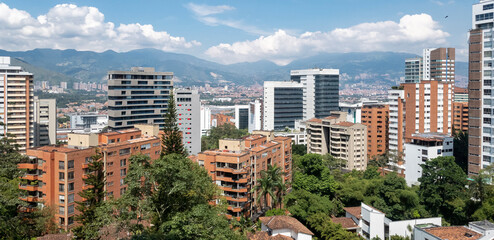 Medellin, Antioquia, Colombia. November 4, 2019: Urban landscape with buildings and blue sky in El Poblado.