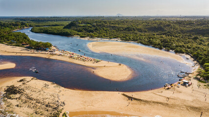Caraíva, Porto Seguro, Bahia. Aerial view of Praia da Barra and mouth of the Rio Caraíva