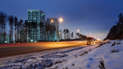 Obraz premium lights of the city highway after sunset