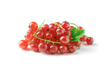 Berries of ripe tasty red currant isolated on white background. red currant with a leaf. a slide of red currants. Red currant berries with leaf isolated on white background.