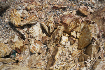 Shale is a fine-grained sedimentary rock that forms from the compaction of silt and clay-size mineral particles that we commonly call mud.