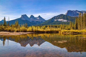 Fototapeta premium Blue Sky Over Autumn Mountains In Canmore