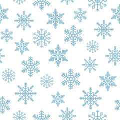 Snowflakes seamless pattern. Blue snowflakes on white background. Background for winter design. 