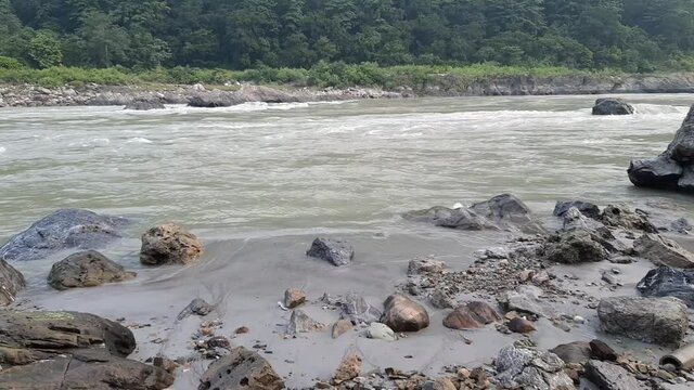 Morning view at GOA beach located in Rishikesh Uttarakhand near Laxman Jhula, Clean view of Ganga river at Rishikesh during early morning time, World famous GANGA river full view