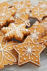 Tasty Christmas cookies on plate, closeup view
