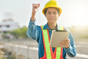 Engineer inspector on  site construction by tablet technology