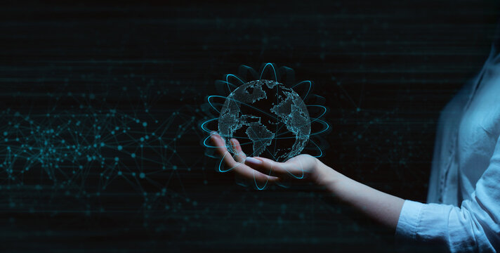 Hand holding earth globe on molecules technology background. Global networking connection and communication technology.