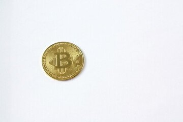Bitcoin gold coin against the background of white.Virtual cryptocurrency concept.
