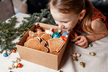 children decorate gingerbread homemade cookies by kids.  master-class. christmas activity