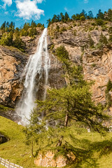 Beautiful alpine summer view at the famous Fallbach waterfall, the highest waterfall in Kaernten, Maltatal, Austria