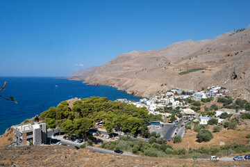 Fototapeta na wymiar Crete - Panoramic view of Hora Sfakíon village located in the region of Chania, Libyan Sea. Greece 