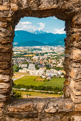 Beautiful alpine summer view with a stone frame at the famous Landskron castle ruins, Villach, Kaernten, Austria