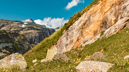 Beautiful alpine summer view with details of a rock at the famous Koelnbreinsperre dam, Maltatal, Kaernten, Austria