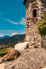 Fototapeta na wymiar Beautiful alpine summer view with details of a stone wall at the famous Landskron castle ruins, Villach, Kaernten, Austria