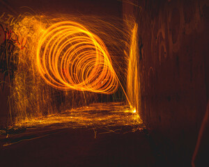 Abstract fire steel wool inside tunnel