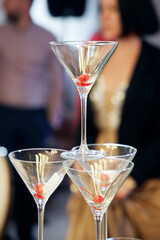 hand holding a martini glass