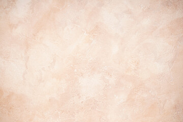Abstract beige textured background. Texture of the wall.