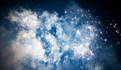Fireworks overlay for holiday backgrounds with copy-space.