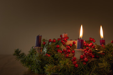 Advent wreath with two candles lit with copy space