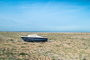 Abandoned boat wreck at the beach of Dungeness, Kent, England