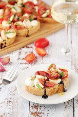 Italian bruschetta with tomatoes and mozzarella