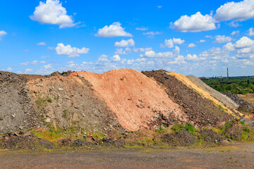 View of slag heaps of iron ore quarry. Mining industry - obrazy, fototapety, plakaty