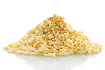 Close-up of Crunchy Murmura made with Puffed Rice, Besan sev and Curry leaves, Indian spicy snacks (Namkeen), in a pile or heap, isolated over white background