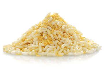Close-up of Lemon Bhel Puffed Rice small besan sev Indian spicy snacks (snacks), Indian spicy snacks (Namkeen), in a pile or heap, isolated over white background