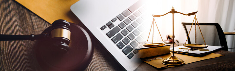 Law theme, mallet of the judge, law enforcement officers, evidence-based cases and documents taken...